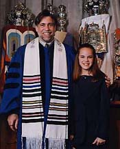 Bat Mitzvah child with Rabbi